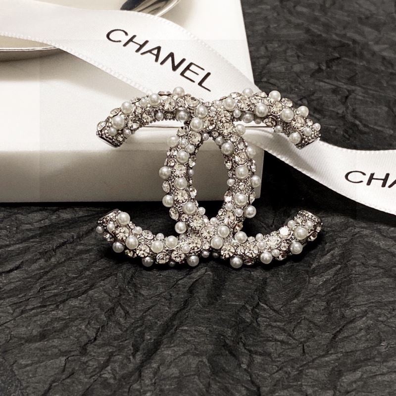 Ch**el brooches
